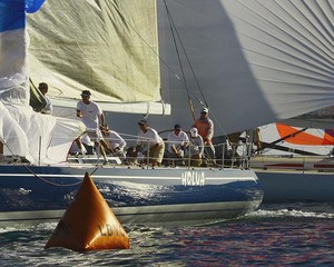 Brack Duker and his Holua crew are in tune at a leeward rounding photo copyright Rick Roberts  taken at  and featuring the  class