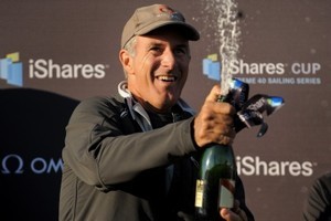 Ed Baird, Alinghi skipper, celebrating victory with G.H. Mumm Champagne on Day 1 at Amsterdam photo copyright Vincent Curutchet/DPPI/OC Events taken at  and featuring the  class