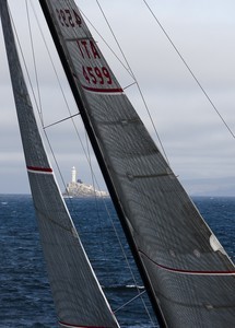 LUNA ROSSA, Sail Number: ITA4599, Owner: Vittorio Volonte, Design: STP 65Baltimore iRELAND passing the Fastnet Rock photo copyright  Rolex / Carlo Borlenghi http://www.carloborlenghi.net taken at  and featuring the  class