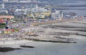 
Thousands of spectators gather at Salthill to watch the In-port race in Galway Bay, for the Volvo Ocean Race photo copyright Rick Tomlinson/Volvo Ocean Race http://www.volvooceanrace.com taken at  and featuring the  class
