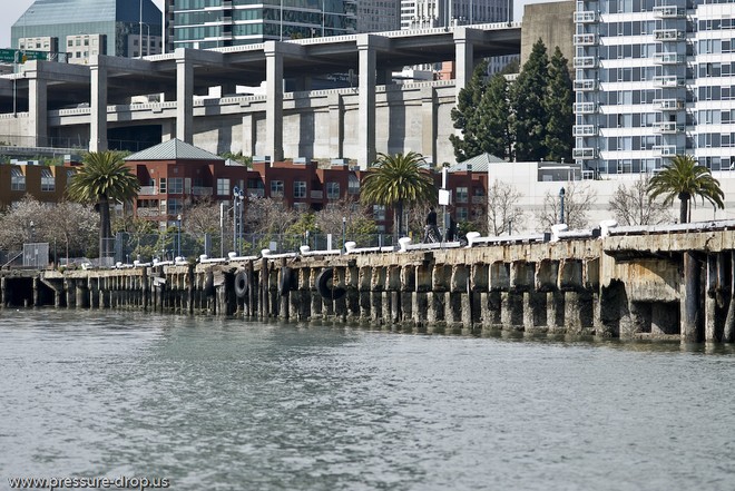 An old image (pre ’89 quake) of Piers 30-32: Located just south of the San Francisco/Oakland Bay Bridge on the Embarcadero, The Public Pier for the 34th America’s Cup © Erik Simonson www.pressure-drop.us http://www.pressure-drop.us