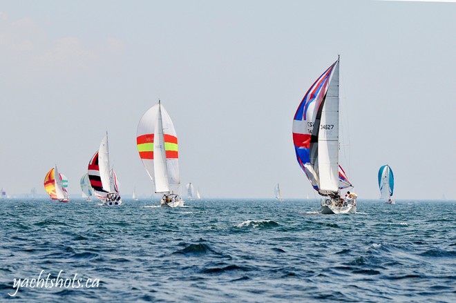 Lake Ontario 300 competitors head east from Port Credit at the start of the race July 17, 2010. SAIL-WORLD.com/Jeff Chalmers (PORT CREDIT, Ont) - Lake Ontario 300 © Jeff Chalmers