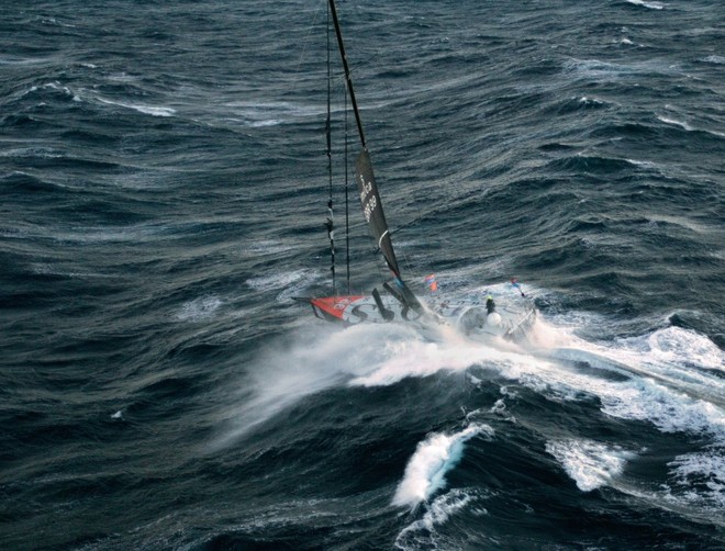 Alex Thomson (Hugo Boss), fights to for survival in a Force 10 storm in mountainous seas the Bay of Biscay, the day after the start of the VELUX 5 Oceans solo round the world yacht race, which features some of the best solo yachtsmen in the world. © onEdition http://www.onEdition.com