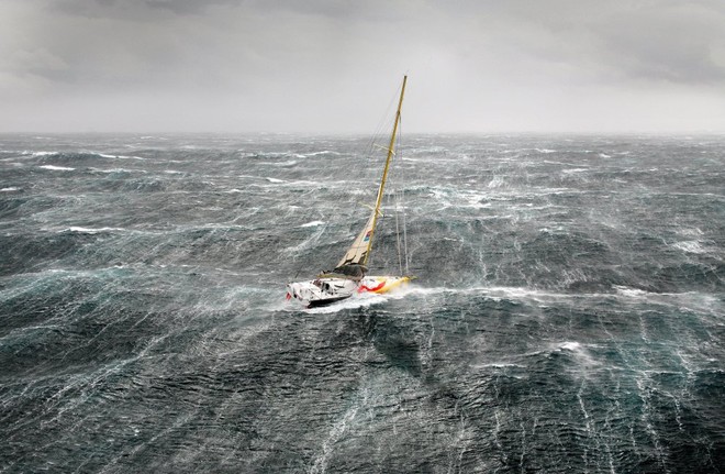Bernard Stamm (Cheminees Poujoulat), fights to for survival in a Force 10 storm in mountainous seas the Bay of Biscay, the day after the start of the VELUX 5 Oceans solo round the world yacht race, which features some of the best solo yachtsmen in the world. © onEdition http://www.onEdition.com
