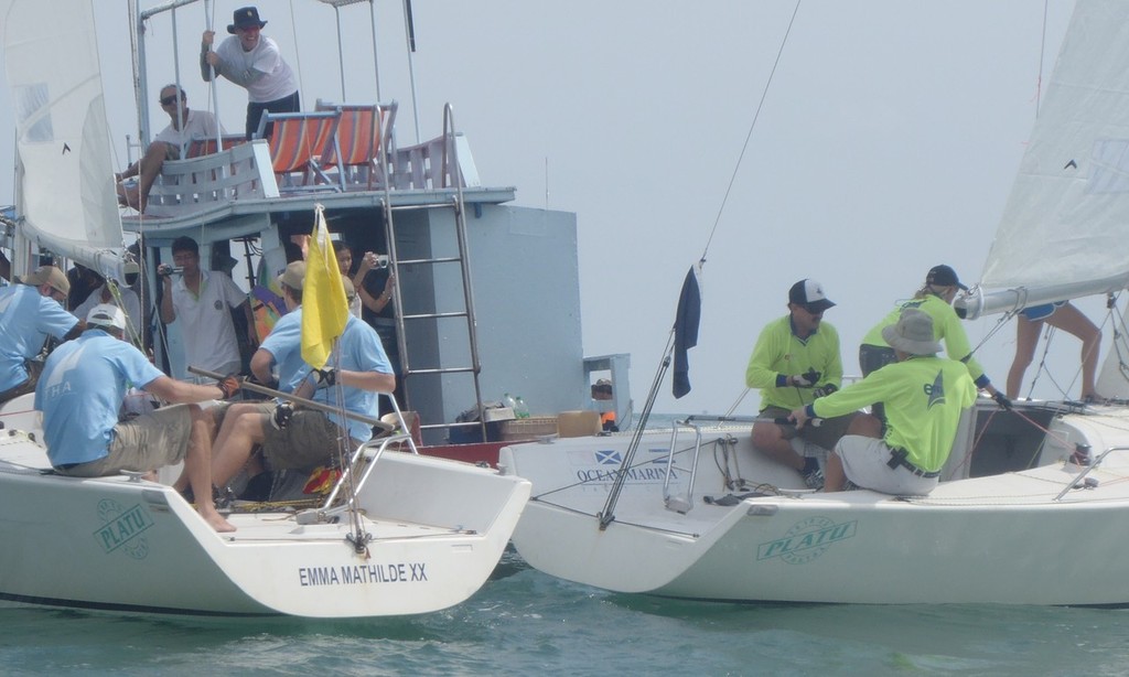 Jon closed the gap to the committee boat, leaving Morten with nowhere to go - MatchRaceThailand Cup I © julie ambrose