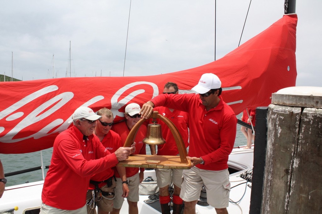 Richards and crew celebrate their sixth Coffs win with the Line Honours Bell Trophy - 30th Pittwater to Coffs Race © Damian Devine