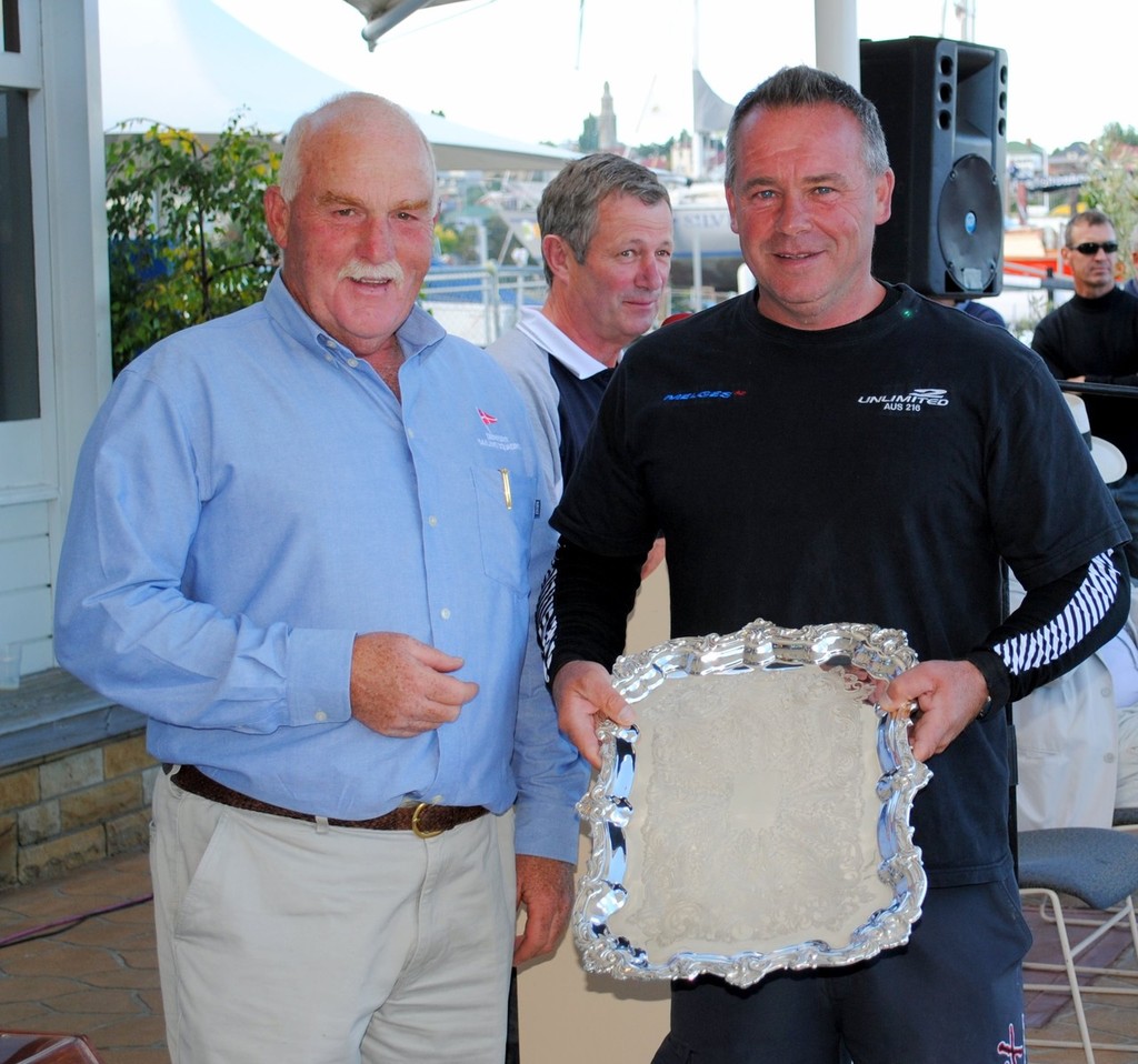 Greg ‘Enzo’ Prescott receives the Tasports Trophy from Derwent Sailing Squadron Commodore Peter Geeves ©  Andrea Francolini Photography http://www.afrancolini.com/