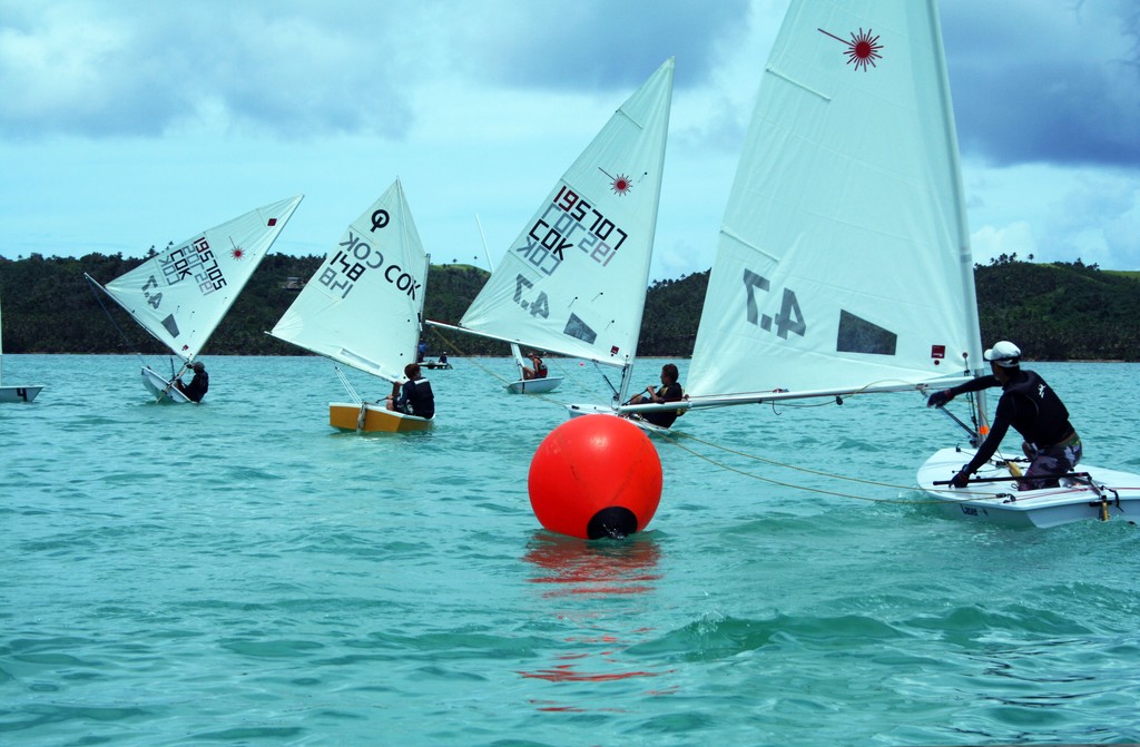 Laser and 4.7 fleets in Aitutaki Lagoon photo copyright Anne Tierney taken at  and featuring the  class