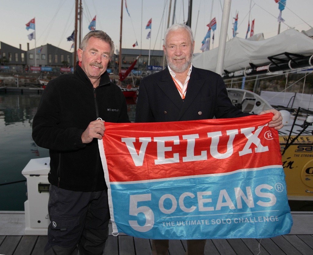 Sir Robin Knox-Johnston presents Skipper Derek Hatfield with the flag that will accompany him around the world © Velux 5 Oceans 