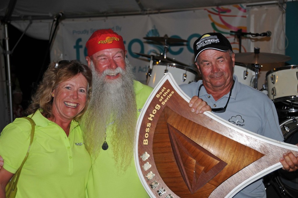  John and Kim Clinton are presented with the Boat Of The Series trophy by Hog’s Breath cafe founder, Don Algie photo copyright John Daffy - BluePRINT Public Relations taken at  and featuring the  class