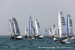2010 International Moth Worlds. Dubai, UAE. Day 1, Start of Race 1. photo copyright ThMartinez / Sea & Co - Copyright http://www.thmartinez.com taken at  and featuring the  class