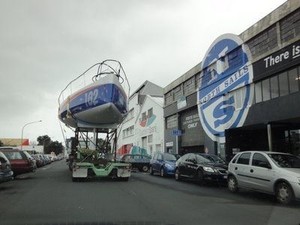 Kiwi40FC passes North Sails loft in Auckland. photo copyright SW taken at  and featuring the  class