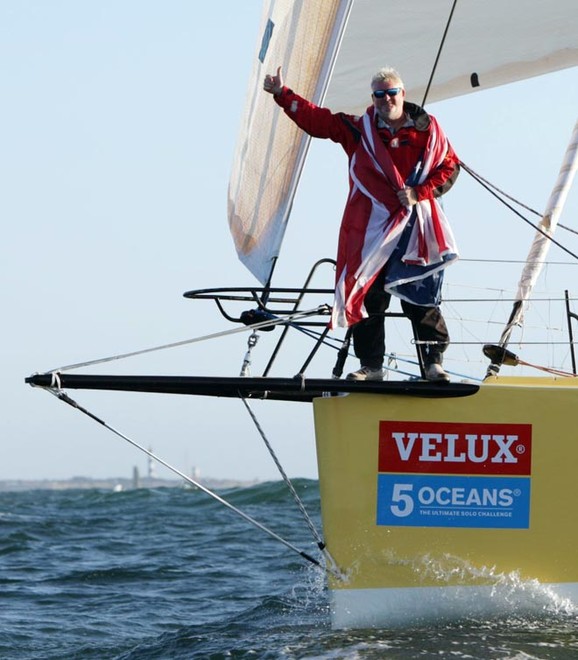 A triumphant Brad Van Liew wins the VELUX 5 OCEANS, having won 5 out of 5 legs, as he crossed the finish line in this evening in La Rochelle, France. © onEdition http://www.onEdition.com