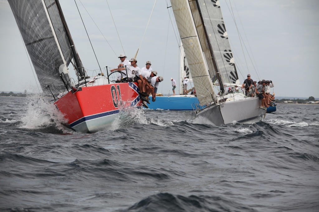 Paul Eldrid and Scott Disley's General Lee emerges from a mark rounding narrowly ahead of The Next Factor. - Geographe Bay Race Week 2011 photo copyright Bernie Kaaks - copyright taken at  and featuring the  class