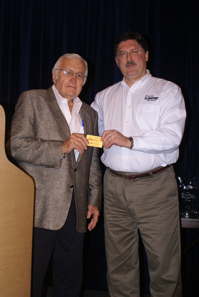 NMMA Executive VP Ben Wold (right) at the presentation to Gordon Houser. photo copyright Bob Wonders taken at  and featuring the  class