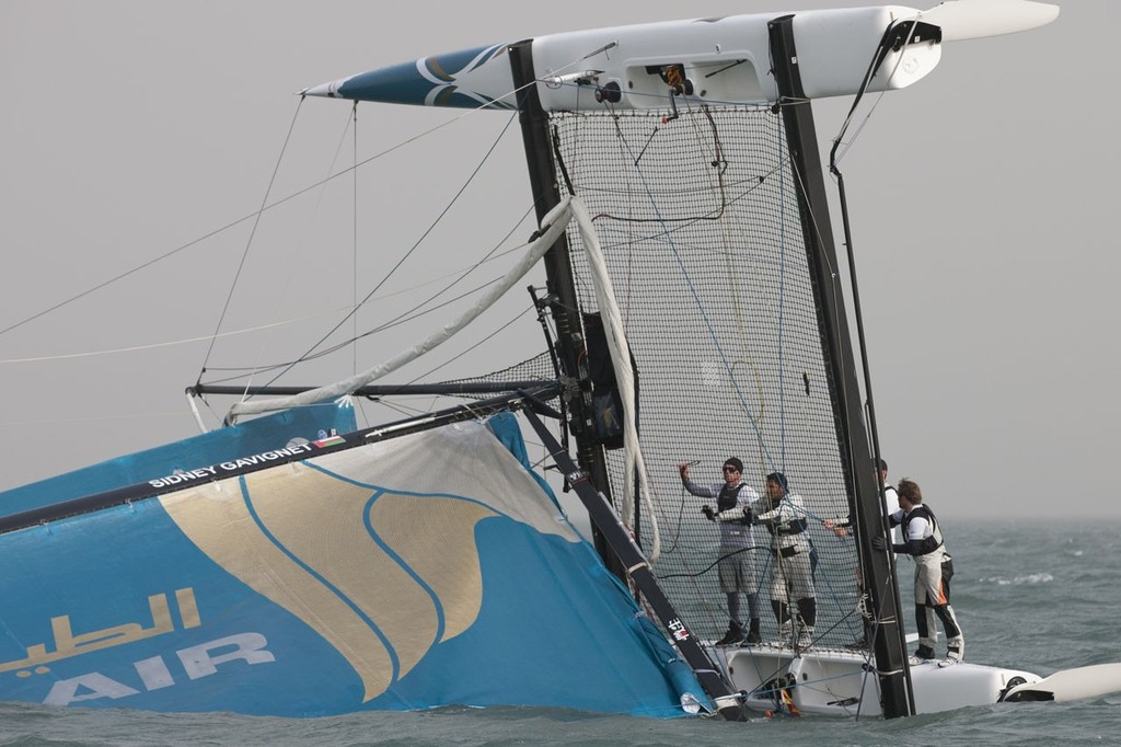 Oman Air capsizing on day 2 of racing - Extreme Sailing Series Act 2 photo copyright Lloyd Images http://lloydimagesgallery.photoshelter.com/ taken at  and featuring the  class