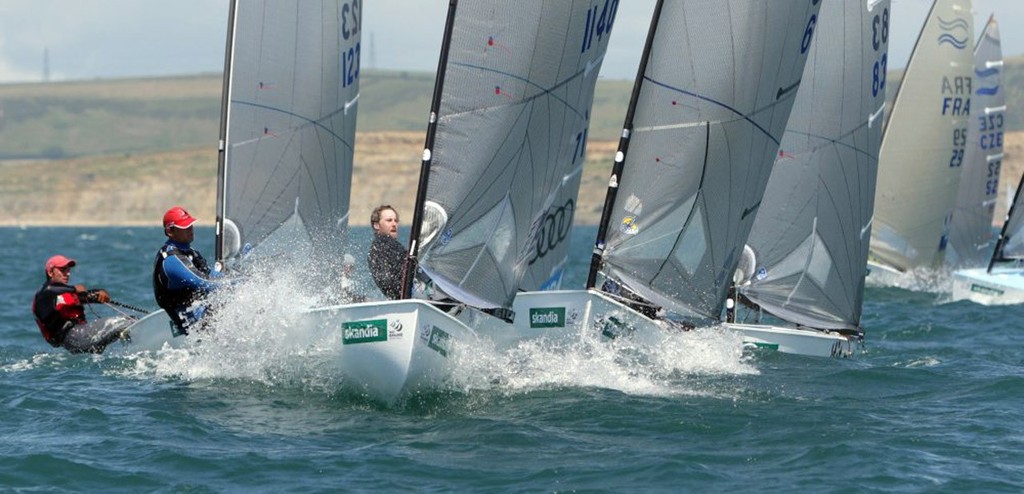 Filippo Baldassari from Italy racing Caleb Paine from USA in the Finn class on day 3 of the Skandia Sail for Gold Regatta, in Weymouth and Portland, the 2012 Olympic venue. photo copyright onEdition http://www.onEdition.com taken at  and featuring the  class