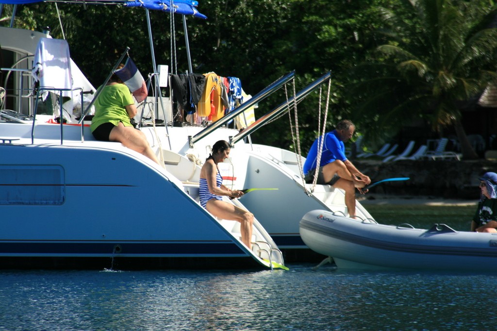Time to relax and enjoy the warm waters of the taaha Lagoon - Tahita Pearl Regatta 2012 photo copyright Maggie Joyce - Mariner Boating Holidays http://www.marinerboating.com.au taken at  and featuring the  class