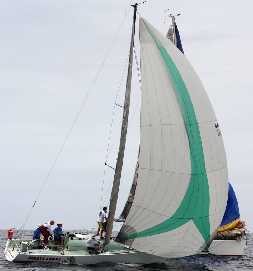  ‘Carats n Kilos’, a Hick 30 skippered by John Santifort from the CYCA won PHS race handicap honours  in 2011 - Pittwater & Coffs Harbour Regatta 2012 photo copyright Damian Devine taken at  and featuring the  class