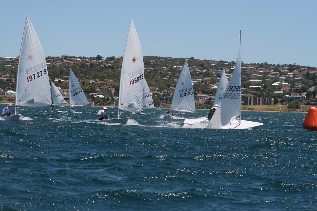 Ryan Kelly leads the fleet during heat 4 - South Australian Laser State Championships photo copyright Clayton Schmerl taken at  and featuring the  class