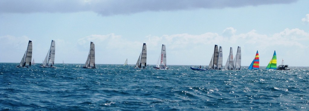 Cool cats - The catamaran fleet purrs off the line, led by the big F18s. - Mandurah Easter Regatta photo copyright Antonio Stefano taken at  and featuring the  class