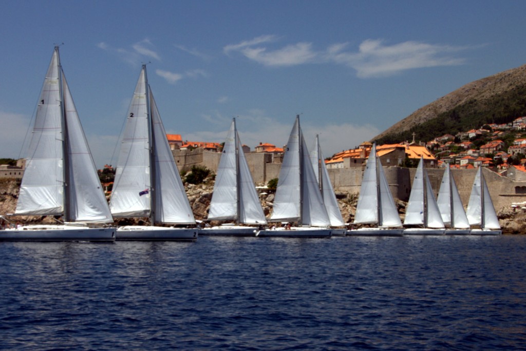 The fleet in a sailpast of the old city of Dubrovnik - The Croatia Yacht Rally 08 June - 24 June 2012 photo copyright Maggie Joyce taken at  and featuring the  class