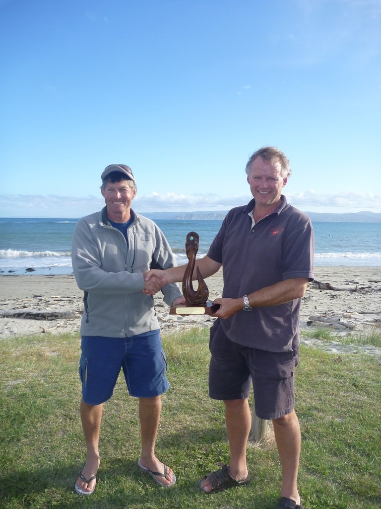 Adrian Mayhead (Commodore of the Wairoa Yacht Club) receives the Port of Napier East Coast Inter Club Championship Trophy from Tim Sandall (Yachting NZ East Coast Councillor) - East Coast Inter Club and Poverty Bay Championships photo copyright Ann Stannard taken at  and featuring the  class