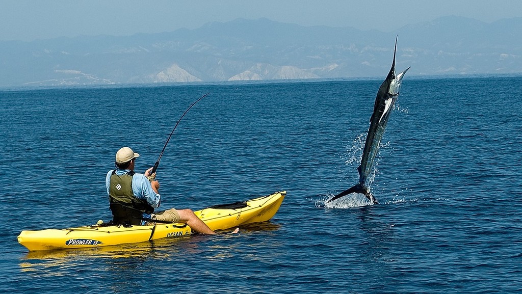 Kayak fishing - not for the faint hearted photo copyright SW taken at  and featuring the  class