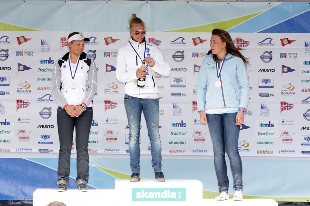 Marit Bouwmeester from the Netherlands wins gold, Evi Van Acker from Belgium wins silver and Annalise Murphy from Ireland wins bronze in the Radial class on the medal day of the Skandia Sail for Gold Regatta, in Weymouth and Portland, the 2012 Olympic venue. © onEdition http://www.onEdition.com