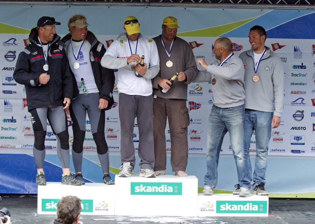 Robert Scheidt and Bruno Prada, from Brazil win gold, Fredrik Loof and Max Salmimen from Sweeden win silver and Diego Negri and Enrico Voltolini win bronze in the Star class on the medal day of the Skandia Sail for Gold Regatta, in Weymouth and Portland, the 2012 Olympic venue. © onEdition http://www.onEdition.com