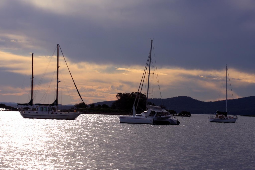 The sun sets at Soldiers Point photo copyright Sail Port Stephens Event Media taken at  and featuring the  class