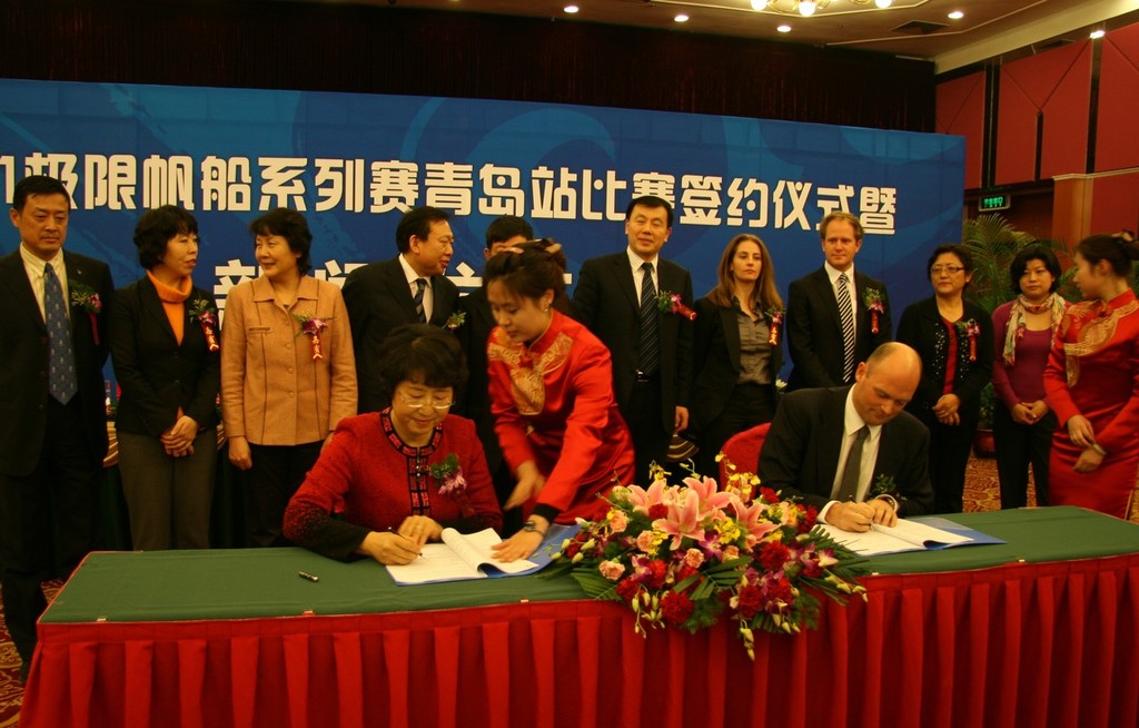 Mdm Zhi-Wei Lin and Mark Turner sign the host venue agreement - Extreme Sailing Series photo copyright Extreme Sailing Series - Asia http://www.extremesailingseriesasia.com/ taken at  and featuring the  class