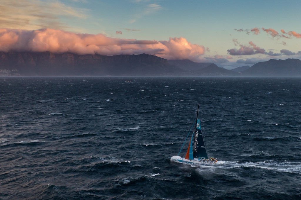Team Telefonica, skippered by Iker Martinez from Spain heads for the finish  on Leg 1 of the Volvo Ocean Race 2011-12 from Alicante, Spain to Cape Town, South Africa at 18:14:25 UTC. photo copyright Ian Roman/Volvo Ocean Race http://www.volvooceanrace.com taken at  and featuring the  class
