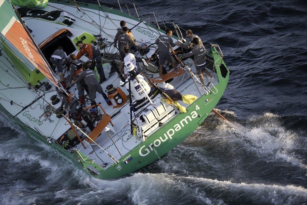 Groupama Sailing Team, skippered by Franck Cammas from France finishes third on leg 1 of the Volvo Ocean Race 2011-12, from Alicante, Spain, to Cape Town, South Africa at 17:28:31 UTC. (Photo Credit must read: PAUL TODD/Volvo Ocean Race) photo copyright Paul Todd/Volvo Ocean Race http://www.volvooceanrace.com taken at  and featuring the  class