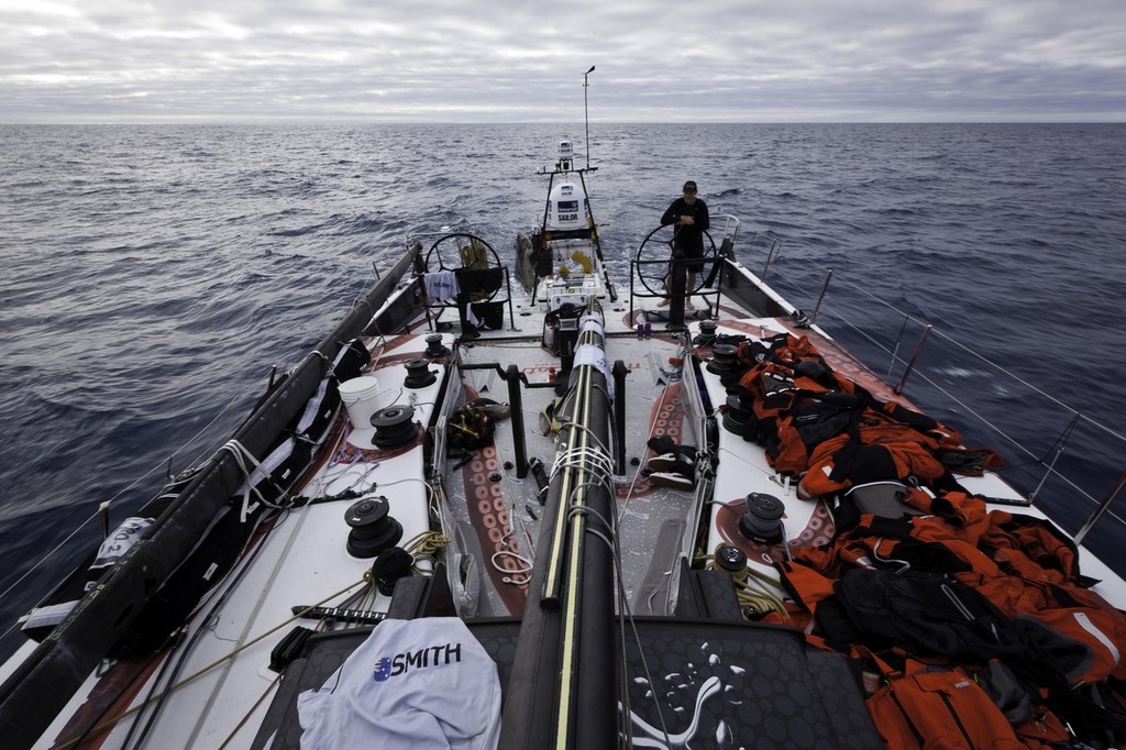 Tom Addis driving ``Mar Mostro`` towards Tristan de Cunha island with all of the foul weather gear on deck to dry. PUMA Ocean Racing powered by BERG is dismasted in the South Atlantic Ocean during leg 1 of the Volvo Ocean Race 2011-12, from Alicante, Spain to Cape Town, South Africa. (Credit: Amory Ross/PUMA Ocean Racing/Volvo Ocean Race) photo copyright Amory Ross/Puma Ocean Racing/Volvo Ocean Race http://www.puma.com/sailing taken at  and featuring the  class
