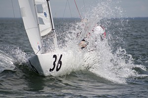 Mid Gybe Crisis bursts through a wave. - 2011 Etchells Victorian State Championships photo copyright  Alex McKinnon Photography http://www.alexmckinnonphotography.com taken at  and featuring the  class