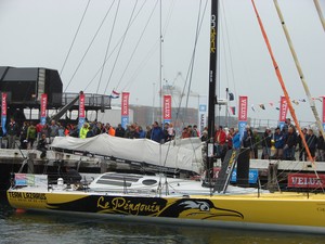 Extra crew assist Brad Van Liew to the start of the Ocean Sprint 3 in Wellington on Sunday. - Velux 5 Oceans photo copyright Genevieve Howard taken at  and featuring the  class