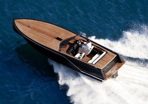 1930s styling extends to teak decking but the rest is pure 2011. photo copyright Premier Marine taken at  and featuring the  class