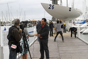 Busy on the marina with media interviews, whilst Team Barry prepare to launch. - Musto Australasian Etchells Winter Championships 2011 photo copyright Teri Dodds http://www.teridodds.com taken at  and featuring the  class