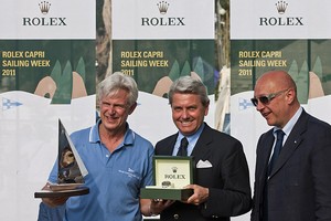 Andres Soriano, ALEGRE, receives a Rolex timepiece from Gian Riccardo Marini, CEO of Rolex SA. Massimo Massaccesi, President of YCC (left to right) - Rolex Volcano Race 2011 photo copyright  Rolex / Carlo Borlenghi http://www.carloborlenghi.net taken at  and featuring the  class