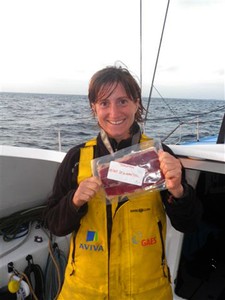 Anna celebrates entering the Mediterranean with her favourite delight: Jamon! - Barcelona World Race photo copyright GAES Centros Auditivos Team http://www.deecaffari.com taken at  and featuring the  class