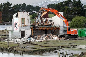 Pleasant Point Yacht Club under demolition. Christchurch Press photo copyright SW taken at  and featuring the  class