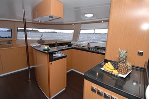 Fountaine Pajot Salina48 Evolution galley with corian bench tops and good ventilation - Multihull Solutions: photo copyright Multihull Solutions http://www.multihullsolutions.com.au/ taken at  and featuring the  class