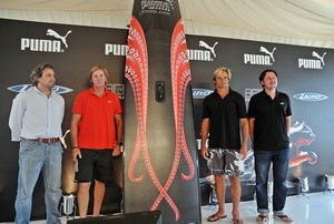 Big wave surfer Laird Hamilton, with skipper Ken Read and PUMA Chief Marketing Officer Antonio Bertone and designer Juan Kouyoumdjian at the PUMA Ocean Racing powered by BERG Propulsion kick-off press conference and unveiling of the new Juan K designed paddleboard, Newport, Road Island, USA, 28 June 2011.
 photo copyright  Dan Armstrong Photography taken at  and featuring the  class