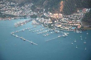 Fethiye marina, showing part of the secure anchorage on the right of the photo photo copyright  SW taken at  and featuring the  class