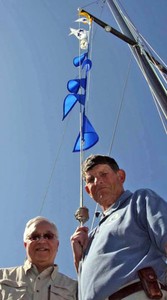 Stewart Wright and Doug Pahnke below their flags marking 29 previous N2Es - Newport to Ensenada photo copyright Rich Roberts http://www.UnderTheSunPhotos.com taken at  and featuring the  class