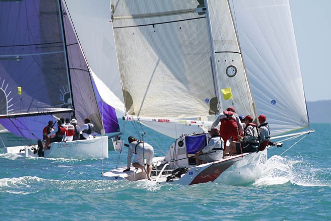 Too Hot Too Trot (purple Kite) and Stealthy - Airlie Beach 22nd Annual Race Week 2011 © Teri Dodds - copyright http://www.teridodds.com