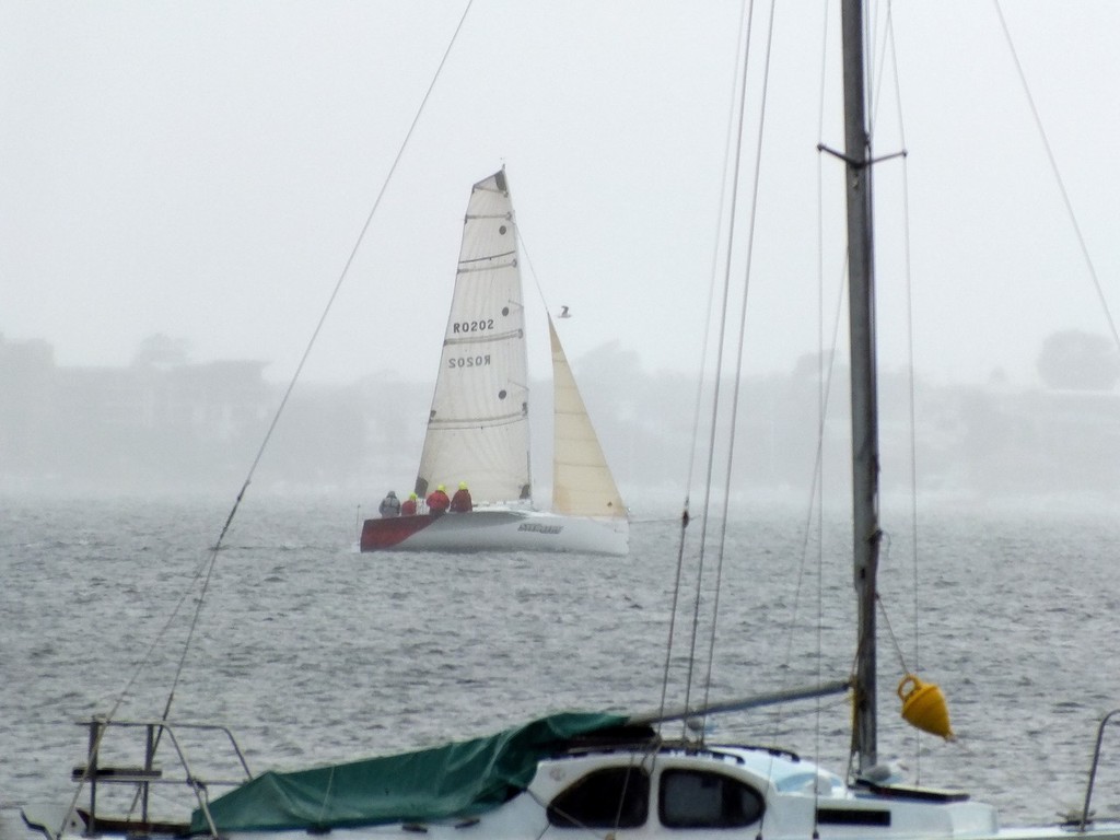 Stealthy, line honours winner in the Heaven Can Wait 24-hour yacht race on Lake Macquarie, on Sunday 2 October 2011 - doing in tough in the cold driving rain. photo copyright Greg Dickins taken at  and featuring the  class