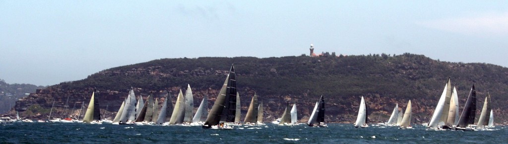 The 2011 Pittwater to Coffs Harbour race start under Barrenjoey Headland - Pittwater & Coffs Harbour Regatta 2012 photo copyright Nicole Scott taken at  and featuring the  class