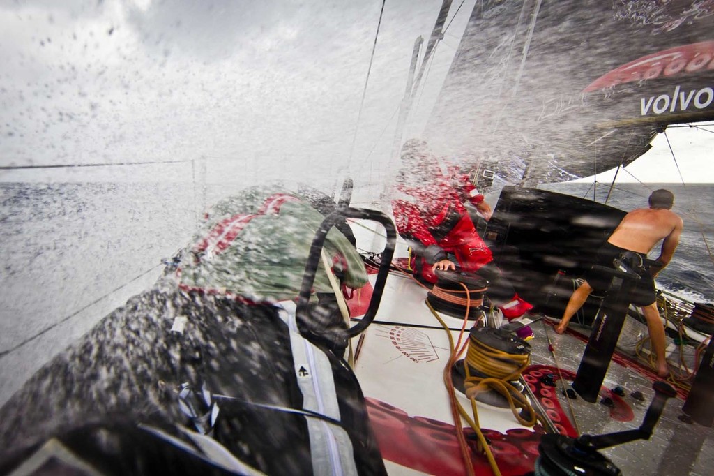 A quick reef before a rain squall arrives. PUMA Ocean Racing powered by BERG during leg 1 of the Volvo Ocean Race 2011-12, from Alicante, Spain to Cape Town, South Africa. (Credit: Amory Ross/PUMA Ocean Racing/Volvo Ocean Race) photo copyright Amory Ross/Puma Ocean Racing/Volvo Ocean Race http://www.puma.com/sailing taken at  and featuring the  class
